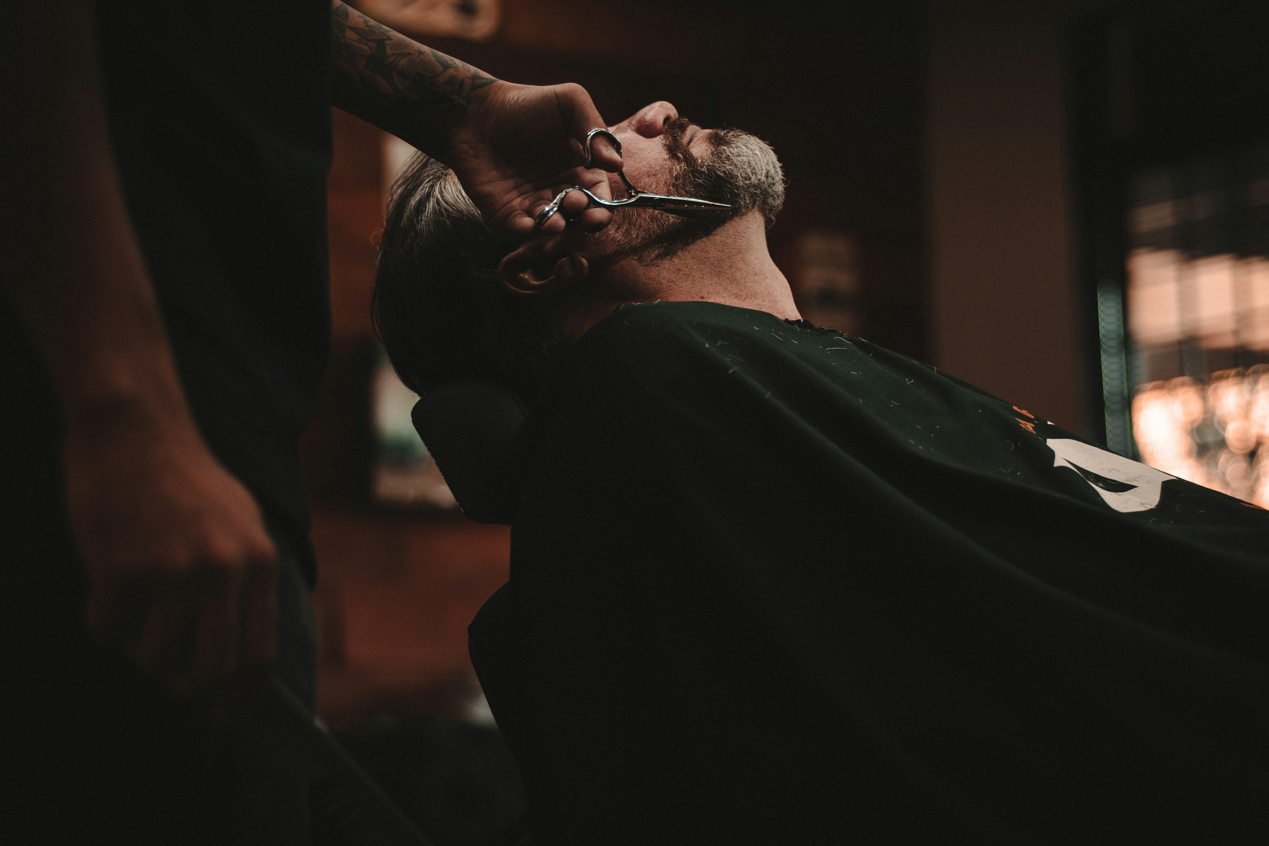 Barber cutting the beard